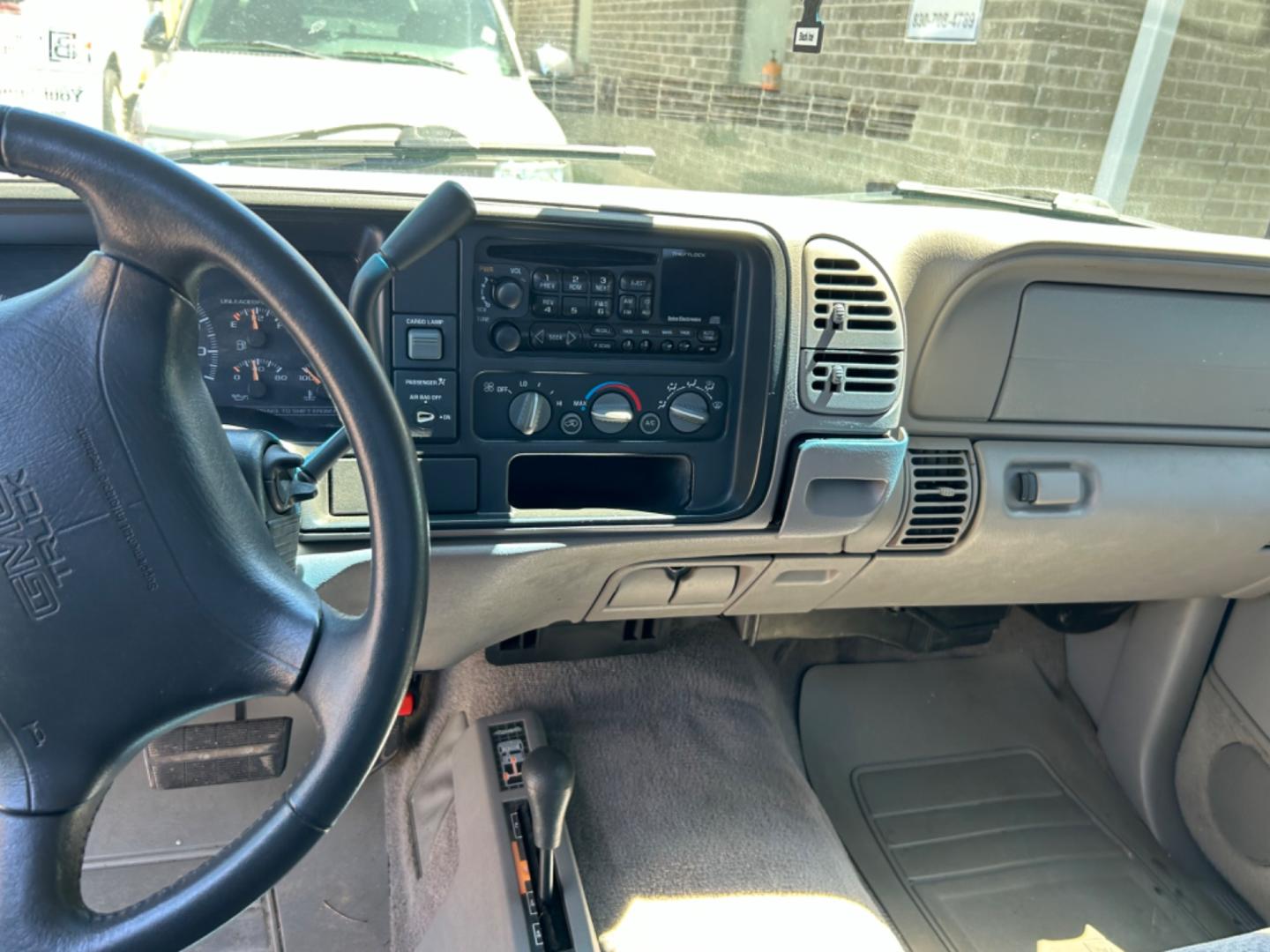 1997 Blue GMC Sierra C/K 1500 Sierra (1GTEK14R3VZ) with an 5.7L V8 F engine, Automatic transmission, located at 1687 Business 35 S, New Braunfels, TX, 78130, (830) 625-7159, 29.655487, -98.051491 - Photo#9